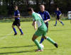 Nebezpenho tonka host Zsolta "Puriho" Pdera (v zelenom) si stri domci Martin Granec. Vavo kapitn PVFA Peter Steiger. Zo zpasu 6. kola 4. ligy skupina A, PVFA - Kalinkovo 2:0